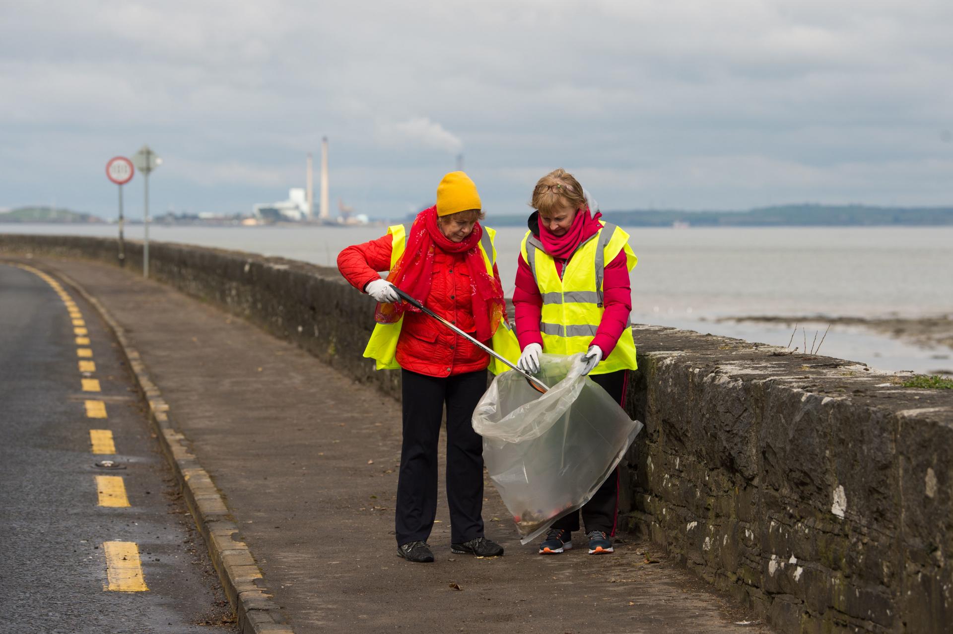 Two women clean up at Glin